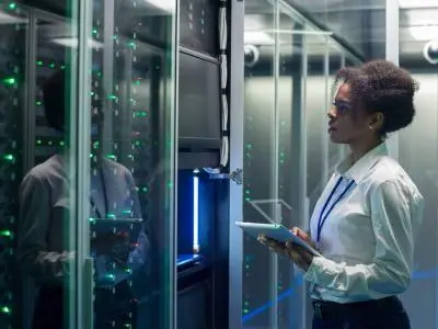 Data centre server rack employee