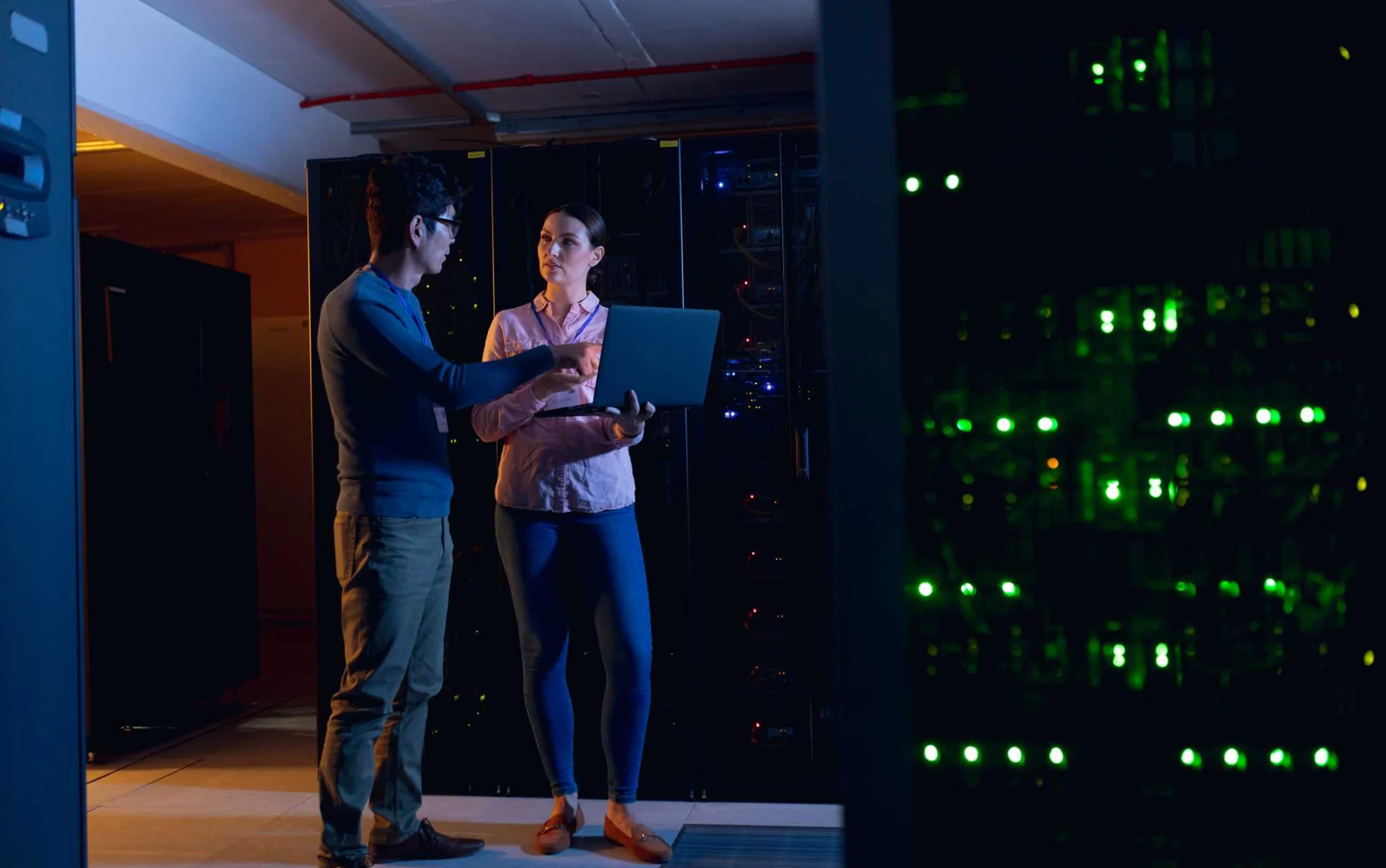Engineers working in a data centre for a BlackBox vs AWS comparison